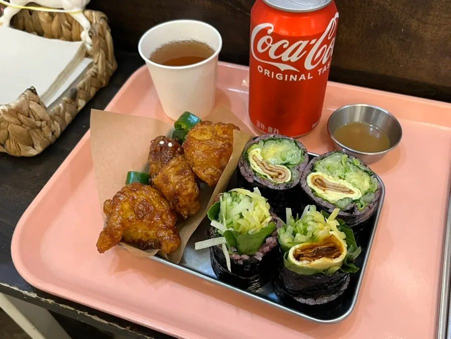 Cross-section of wasabi gimbap with whole romaine