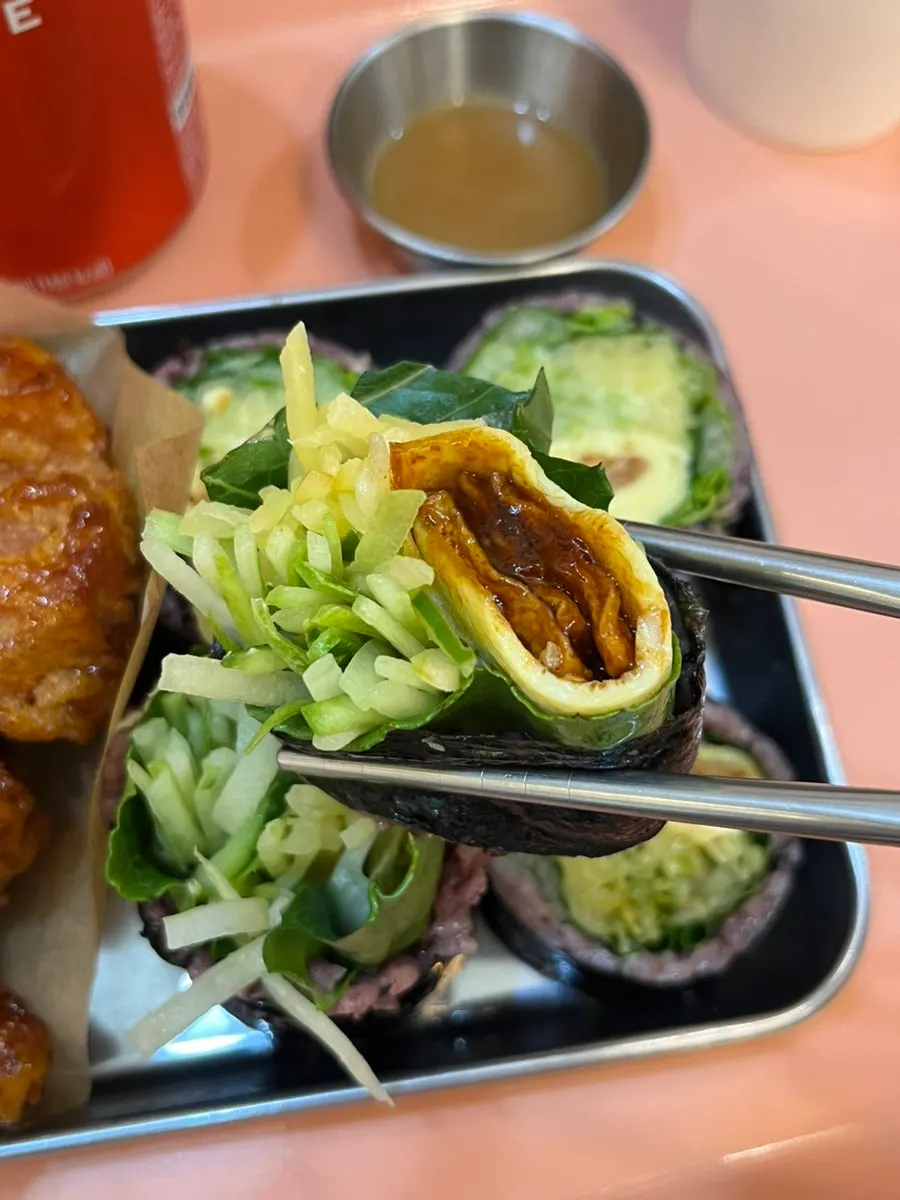 Soy sauce fried chicken topped with fresh chili