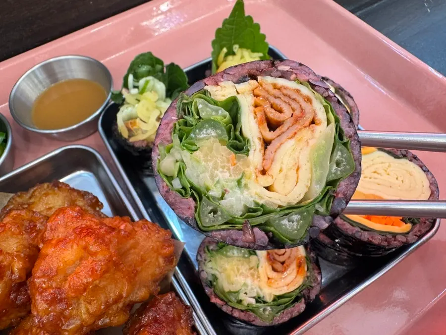 A roll of wasabi double-cheese egg gimbap