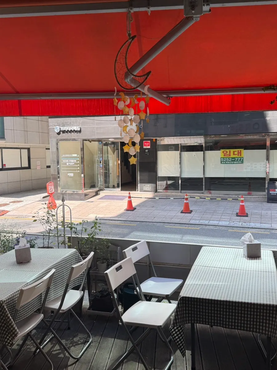 View of the outdoor seating at Halls Gimbap Main Branch