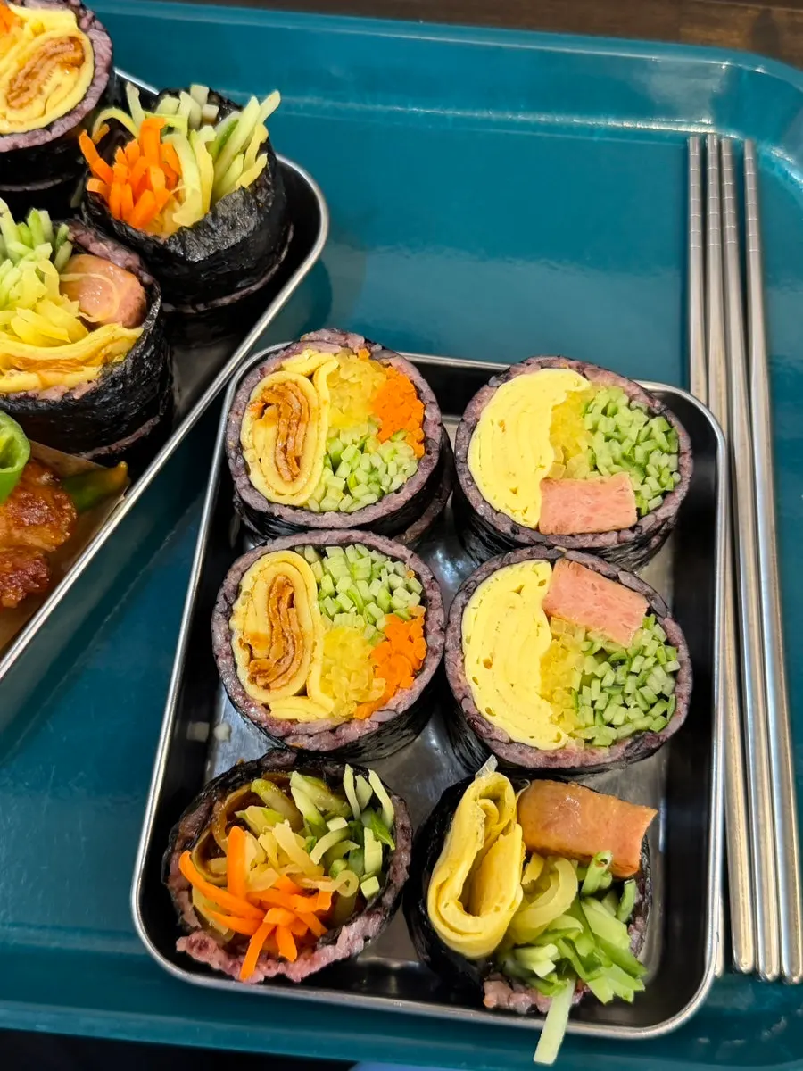 Cross-section of gimbap packed with shredded vegetables