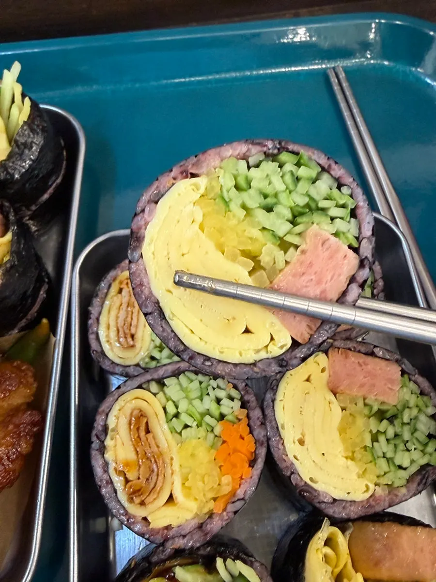 Close-up of gimbap with Spam and egg omelet