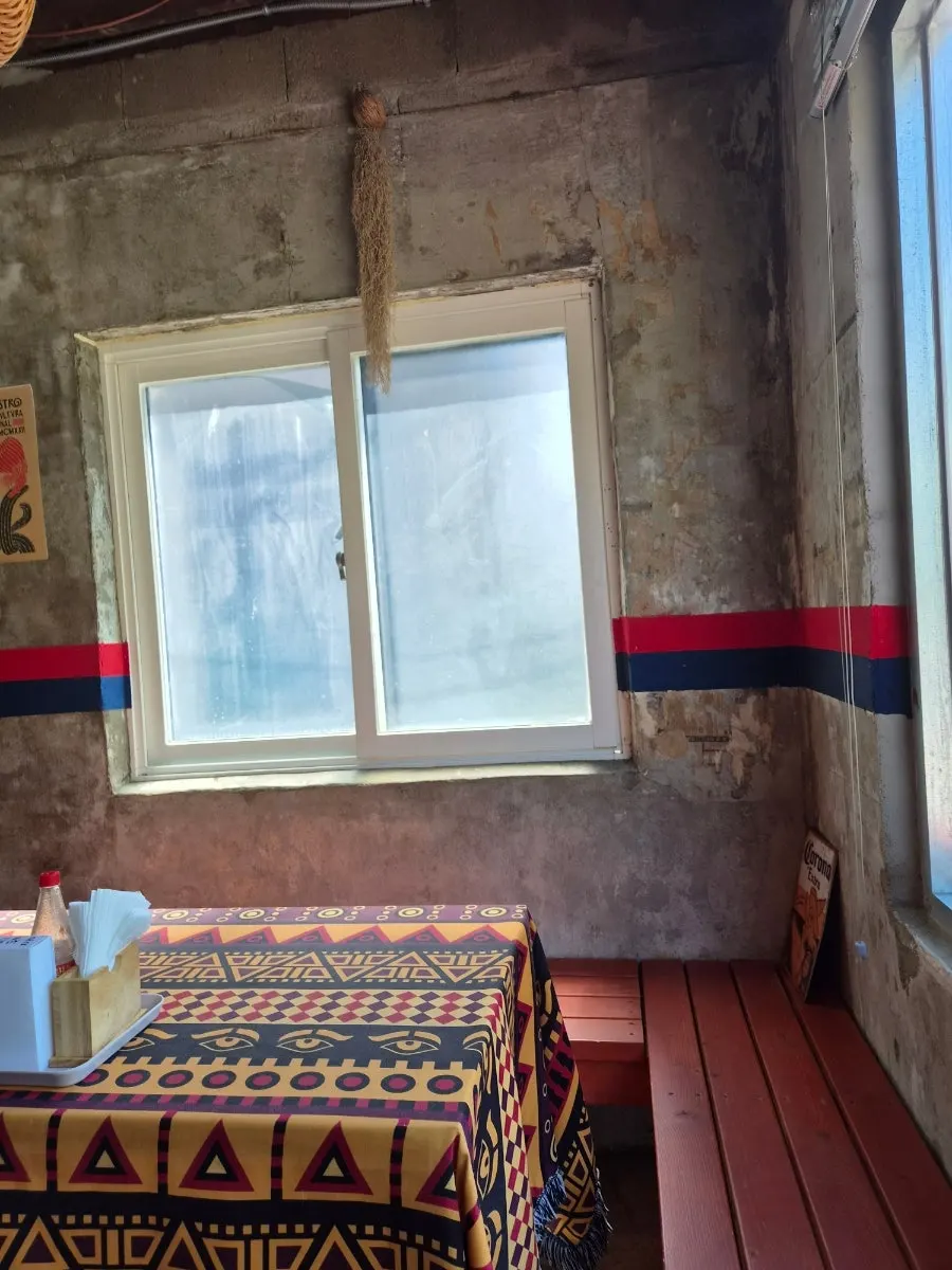 Inner bar table with a view of the kitchen