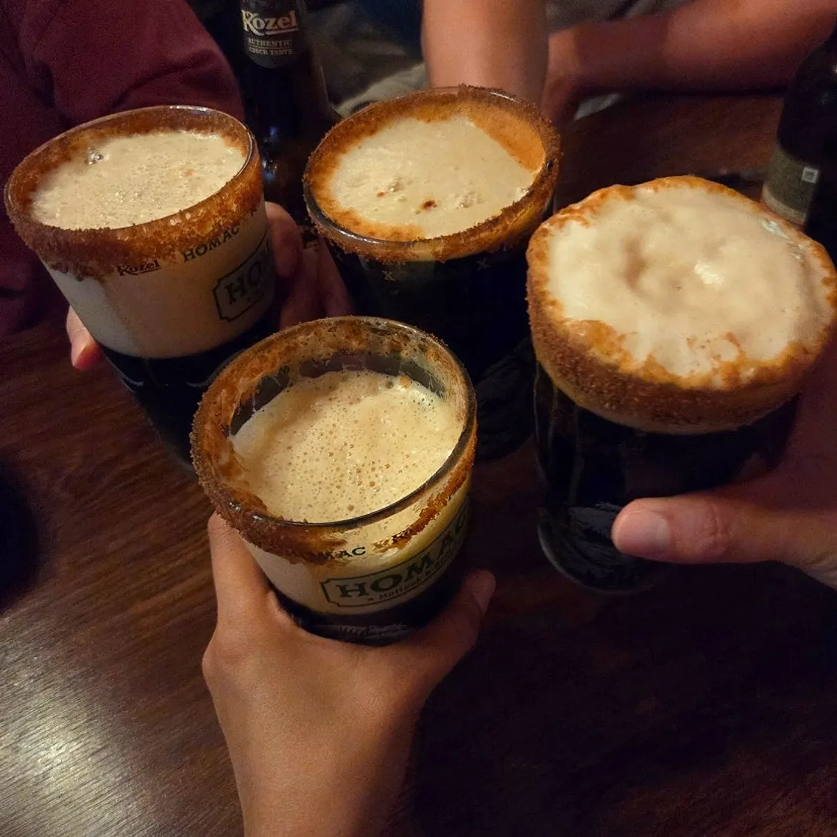 Close-up of glass filled with Kozel Dark