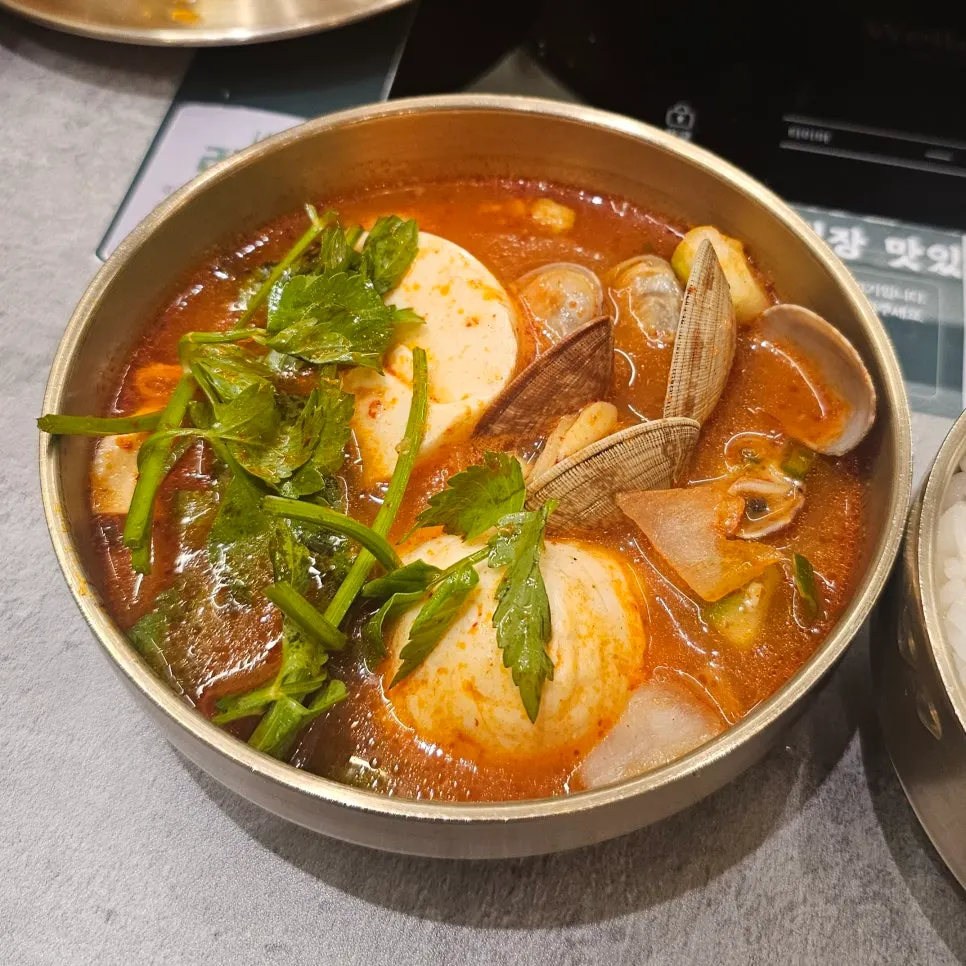 Sundubu hot pot boiling with egg added in