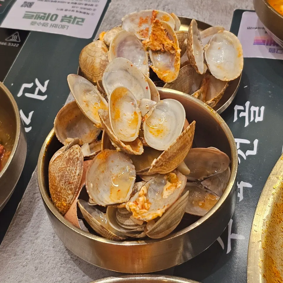 Egg and sundubu on a spoon