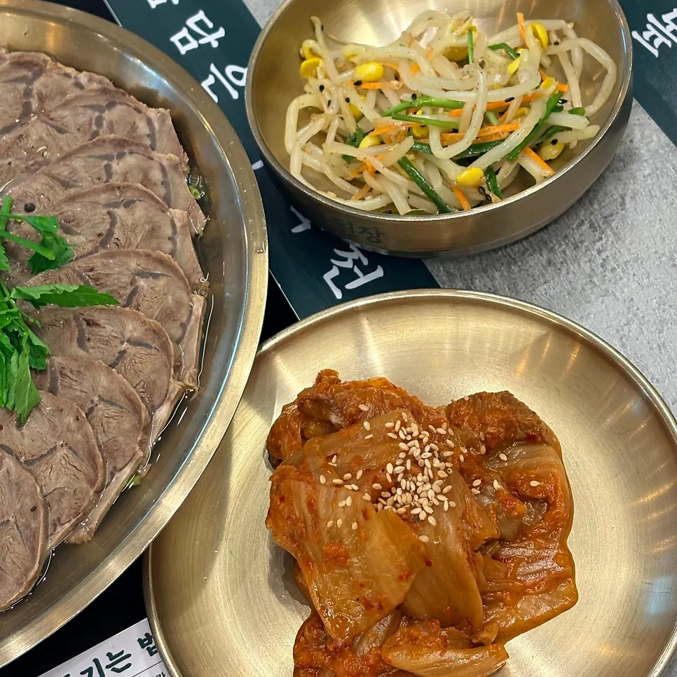 Hot pot and side dishes served together at Ok Doenjang