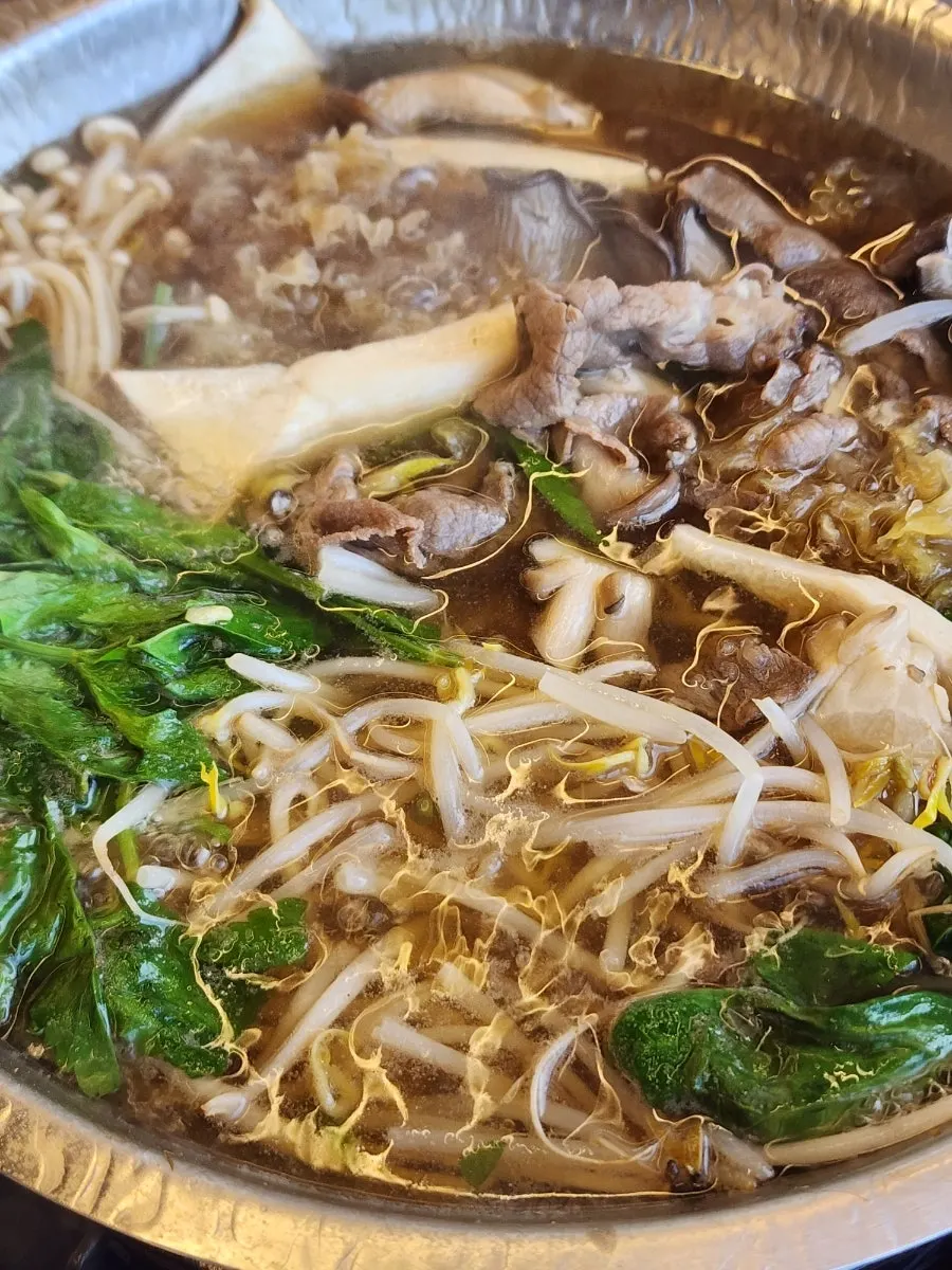 Australian beef chuck being cooked in the shabu broth