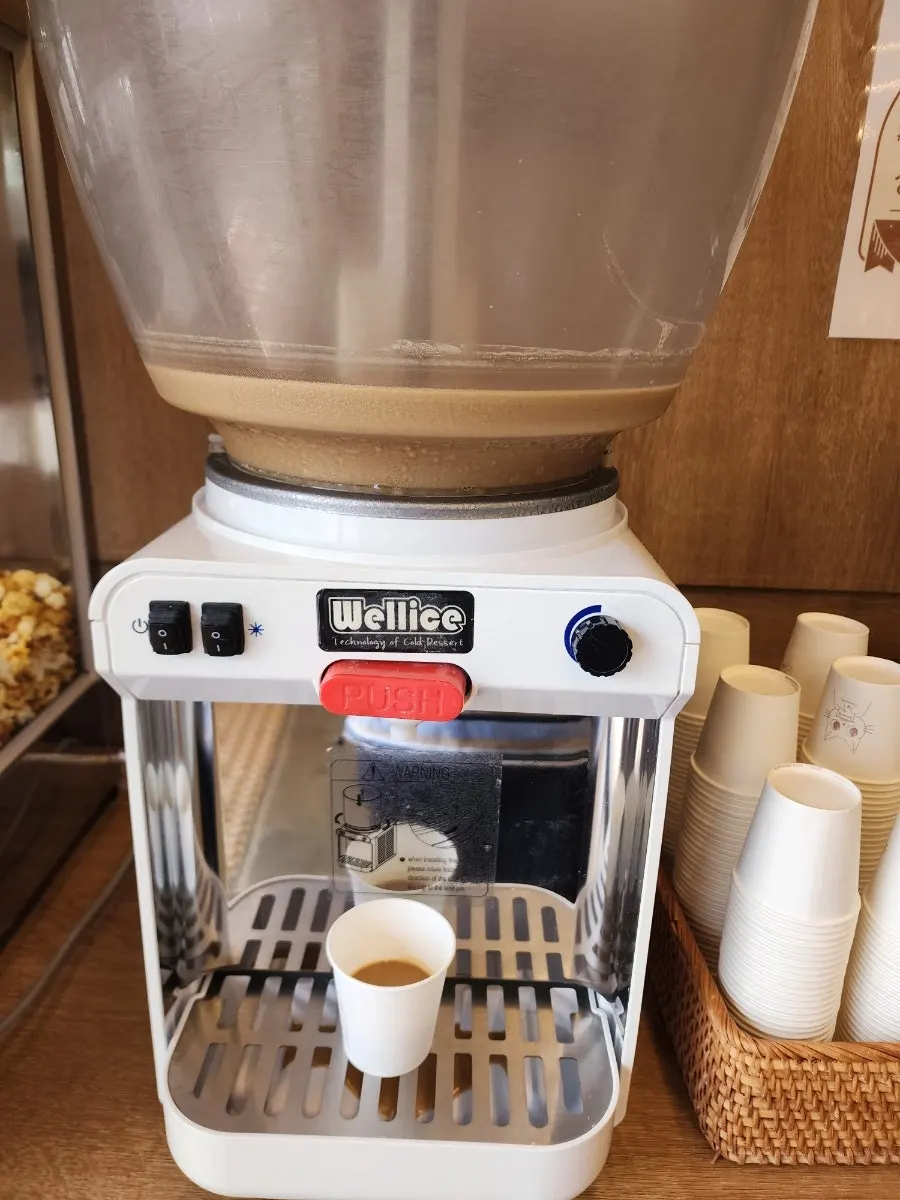 The machine popping fresh popcorn on site