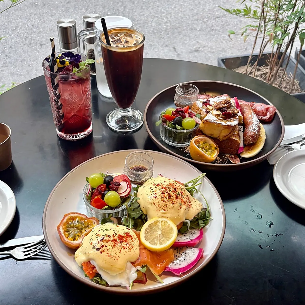 French toast and eggs Benedict set together on the table