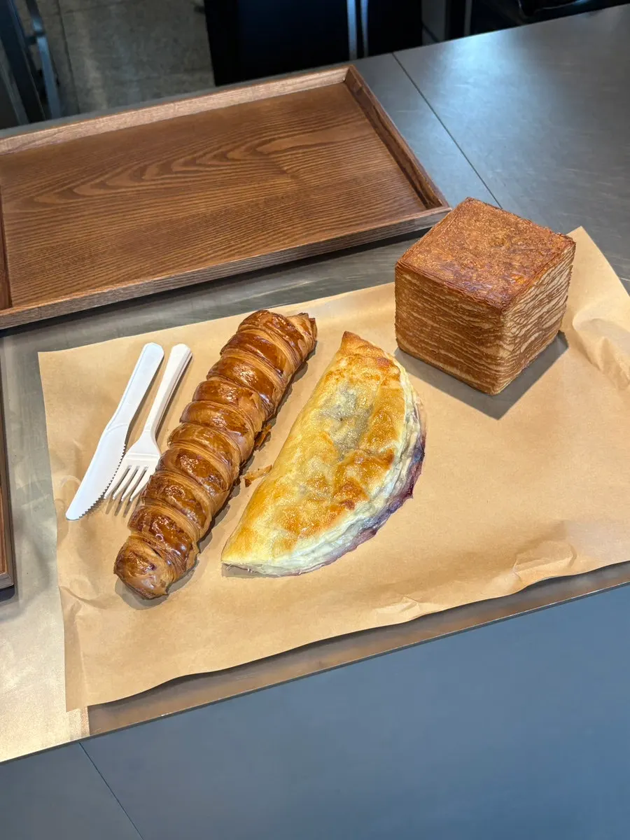 Choosing bread at Gil151 Hanok Cafe's bakery