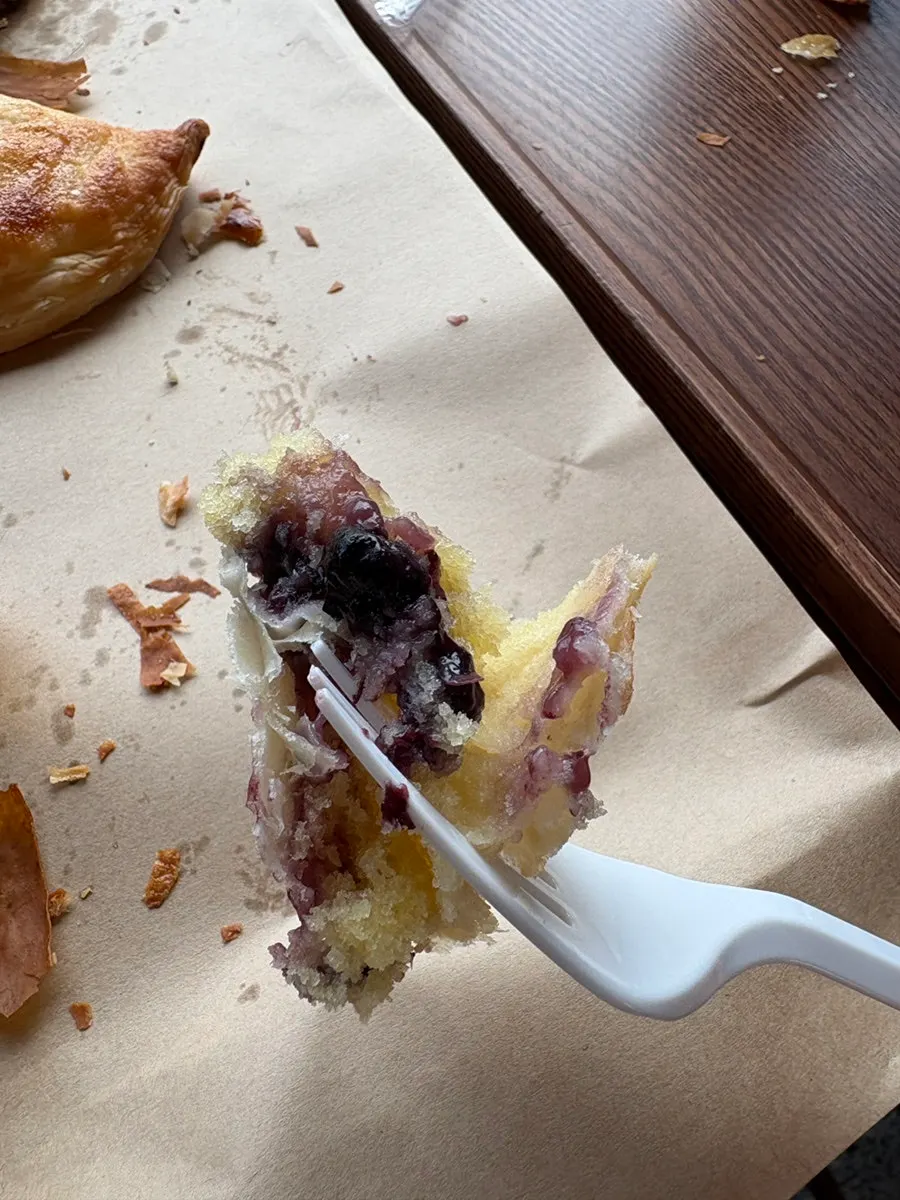 Cross-section of blueberry bread on a plate