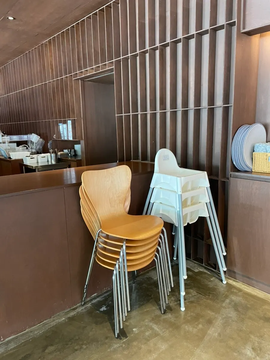 Spacious café interior with floor-to-ceiling windows