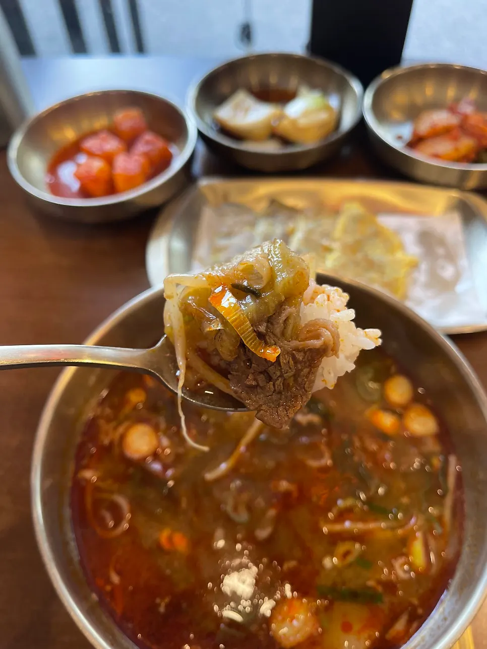 Rice mixed into broth as part of the beef gukbap set