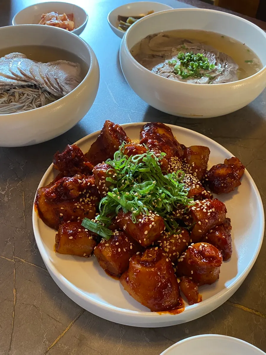 Anok's pork tail jjim coated in red sauce