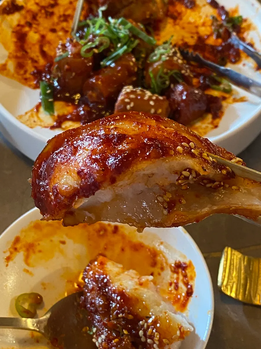 Pork tail jjim with tender meat attached to the bone