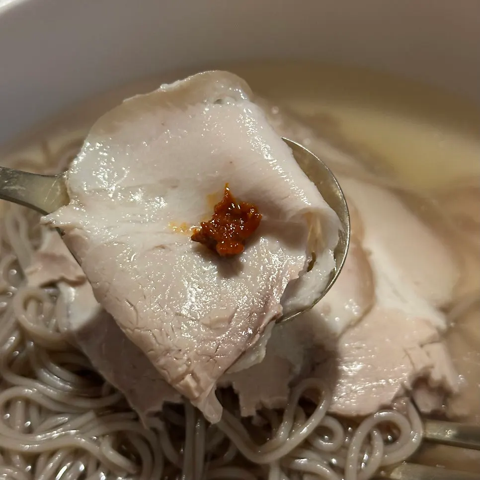 Dipping sauce for meat alongside side dishes
