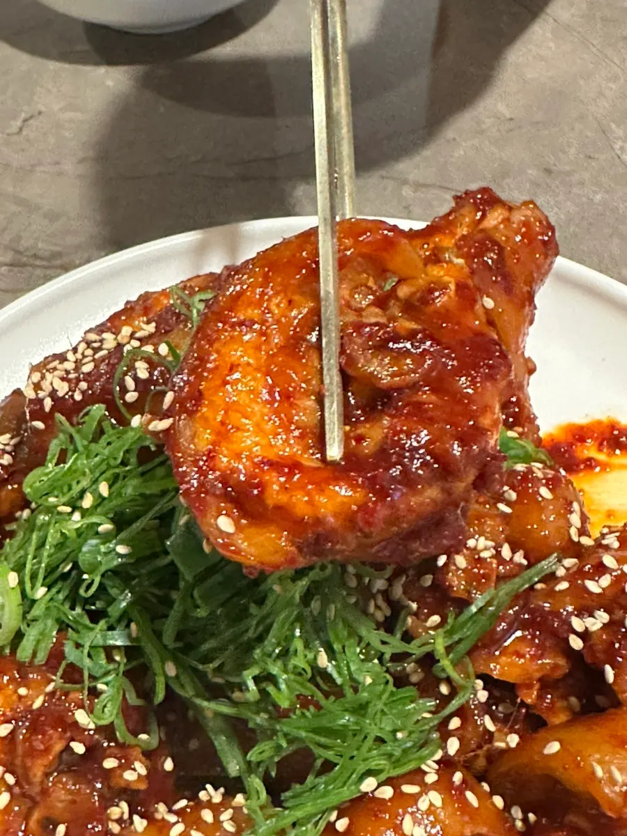 Pork tail jjim served alongside gomtang and naengmyeon