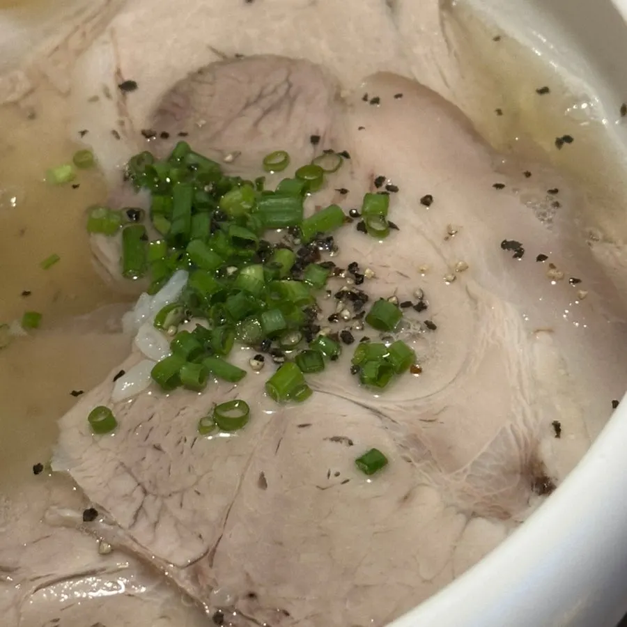Clear pork gomtang topped with big chunks of meat