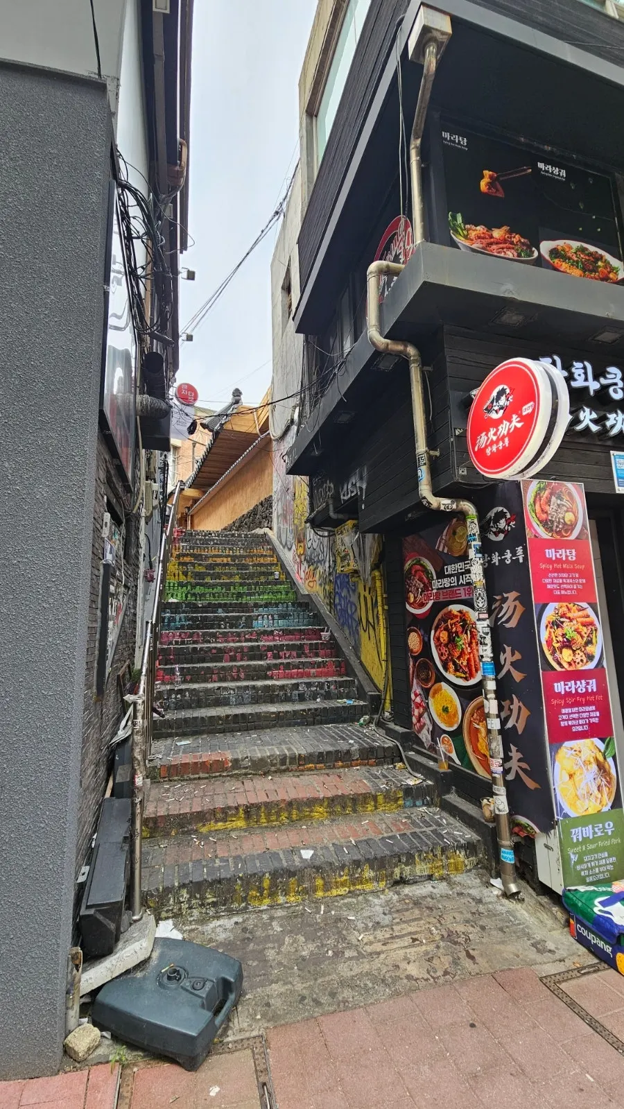 Stairs and building entrance leading up to Anok in Hongdae