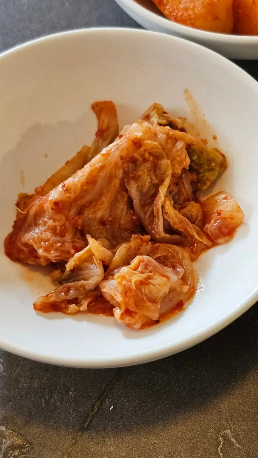 A side dish plate of napa cabbage kimchi at Anok