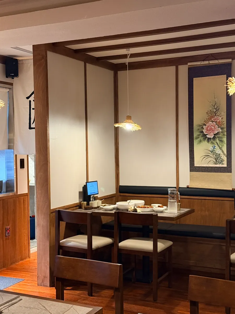 A table for four with wide tabletop at Anok