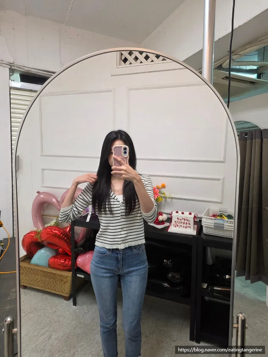 Full-length mirror next to the props