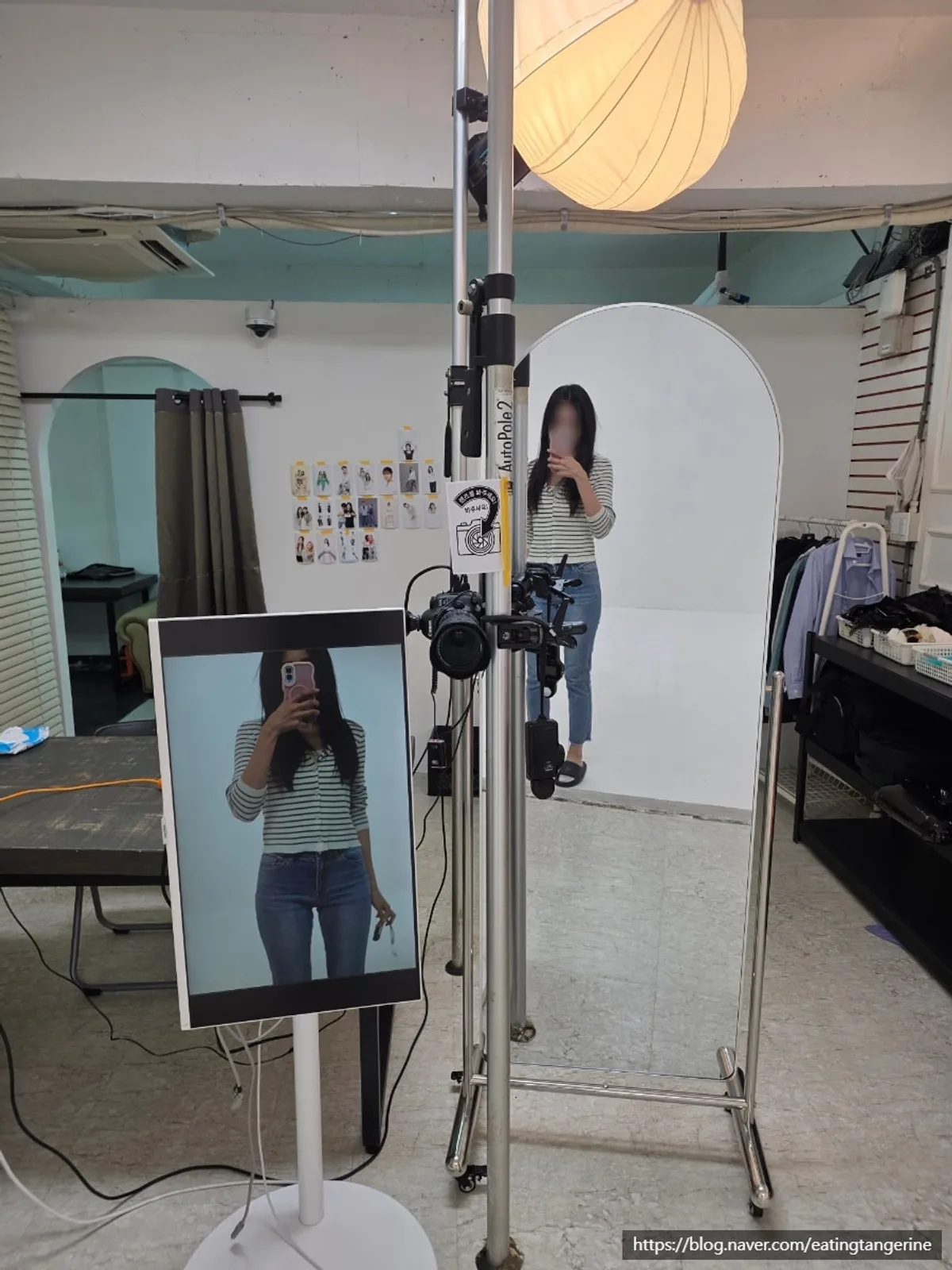 Shooting space with a full-length mirror and monitor for checking shots