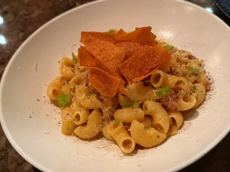 Squid-ink linguine with tomato ragù