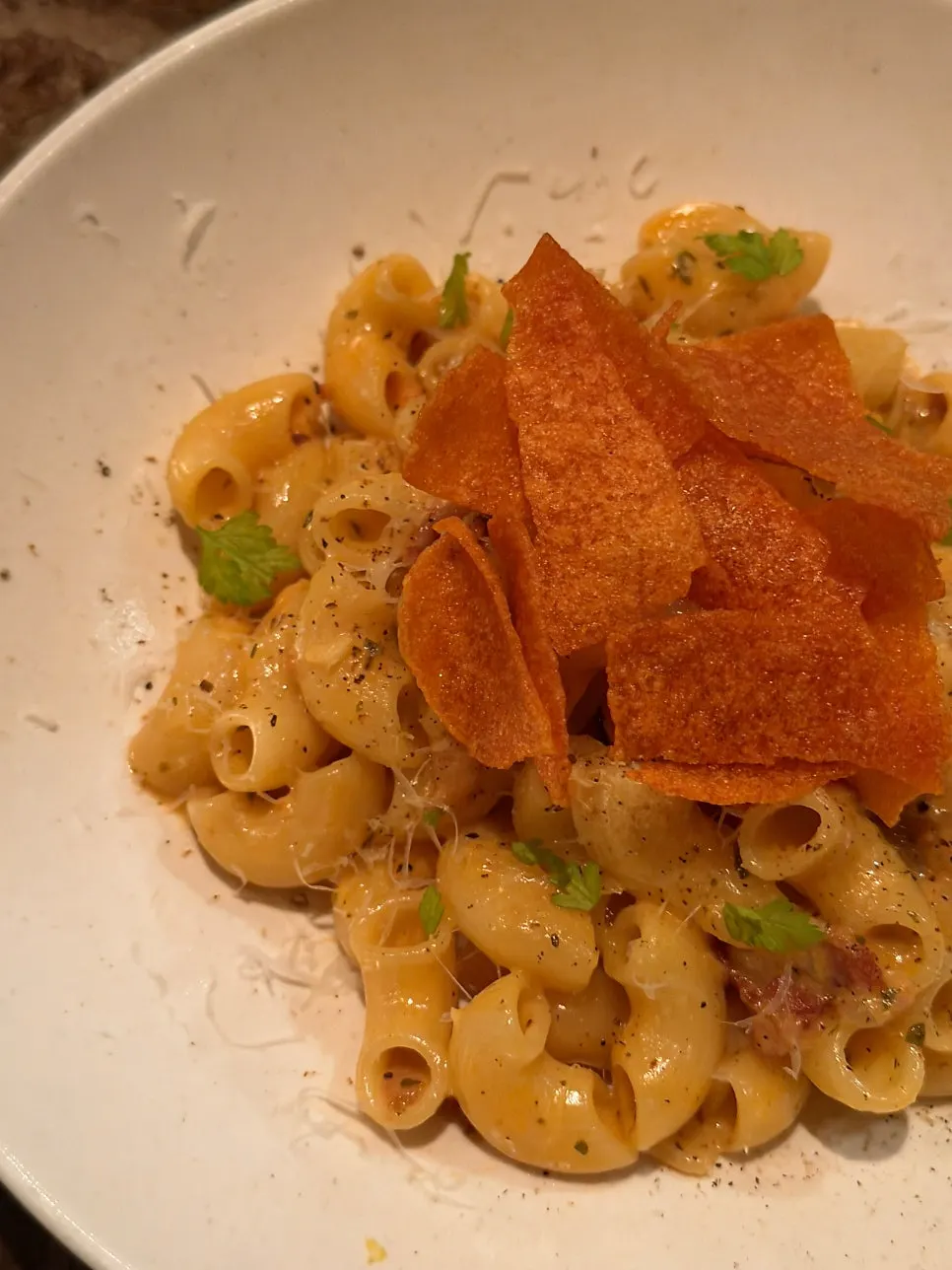 Rosé mac and cheese topped with crispy fried kimchi