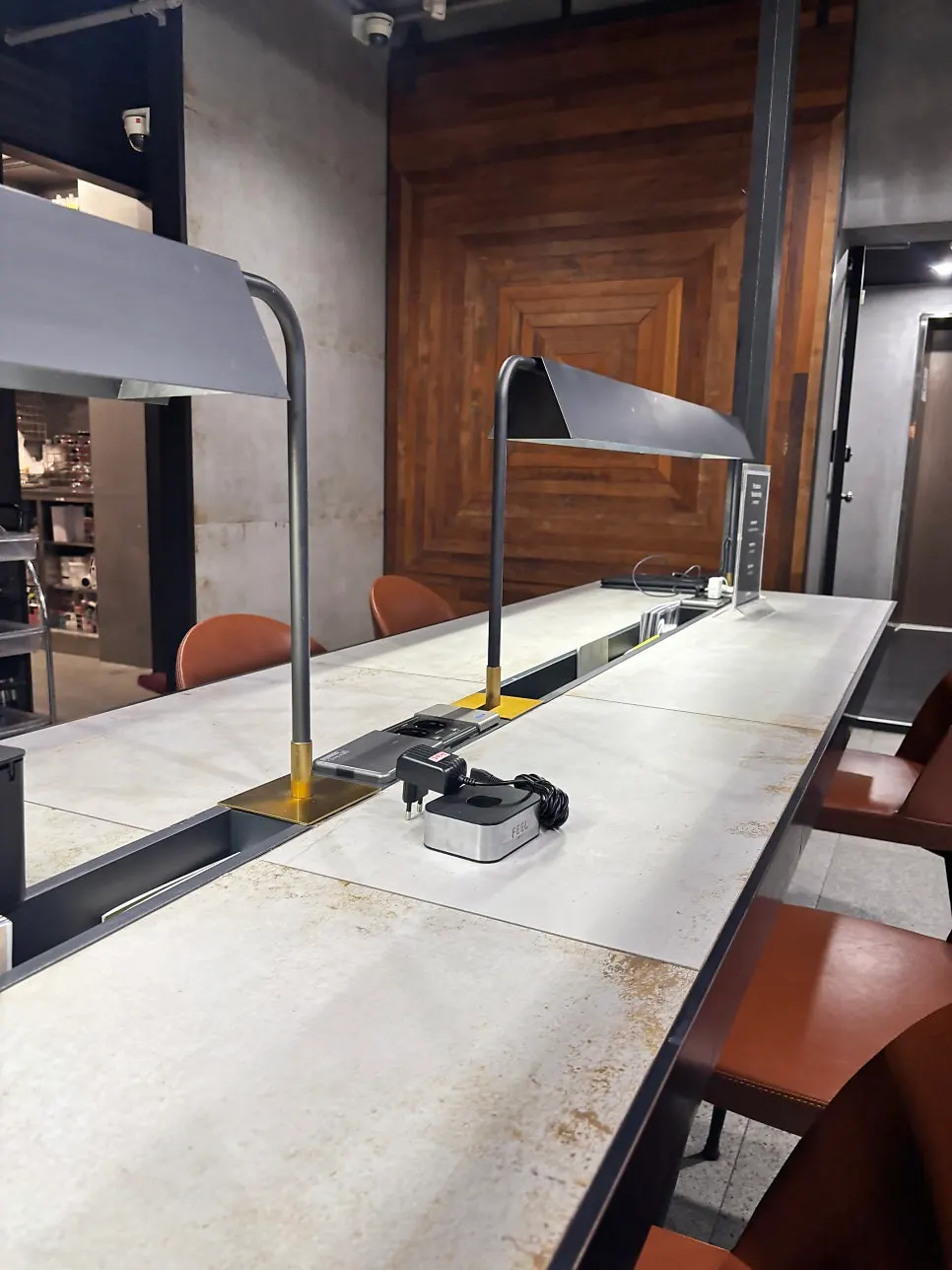Seating with magazines and charging outlets for dye or perm waiting time