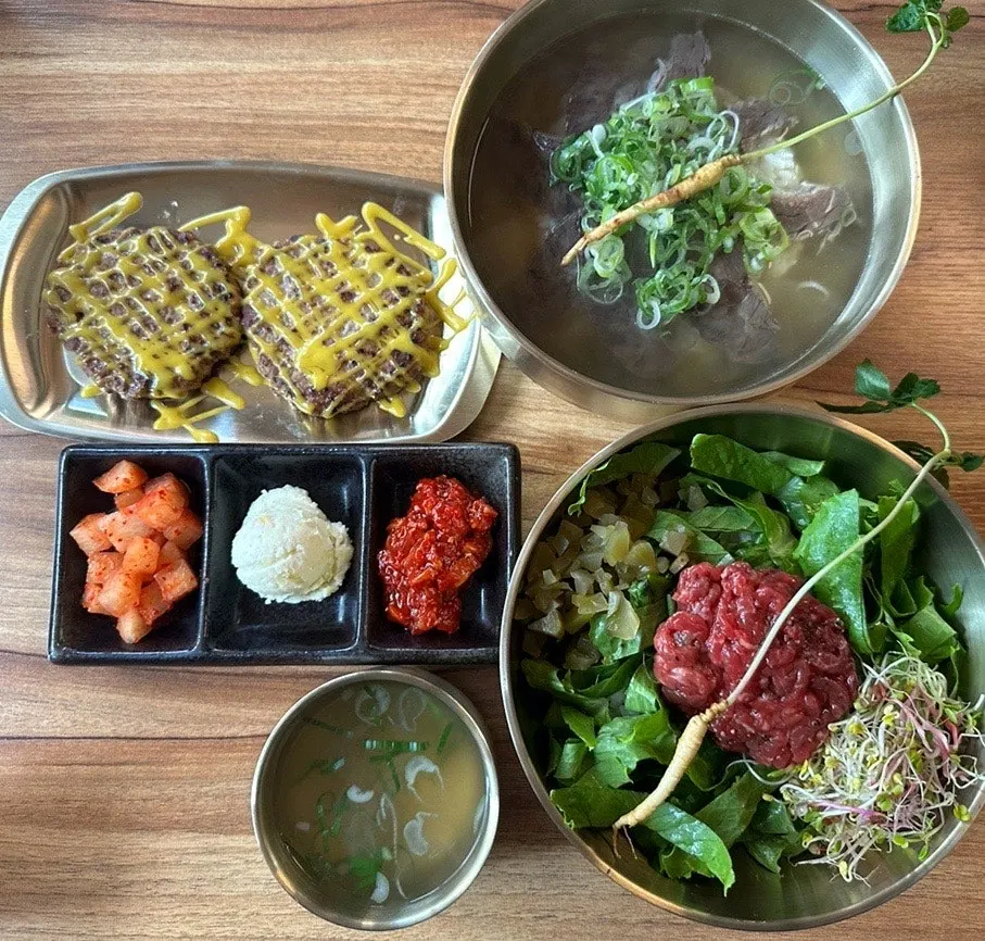 Kkakdugi, potato salad and squid jeotgal side dishes