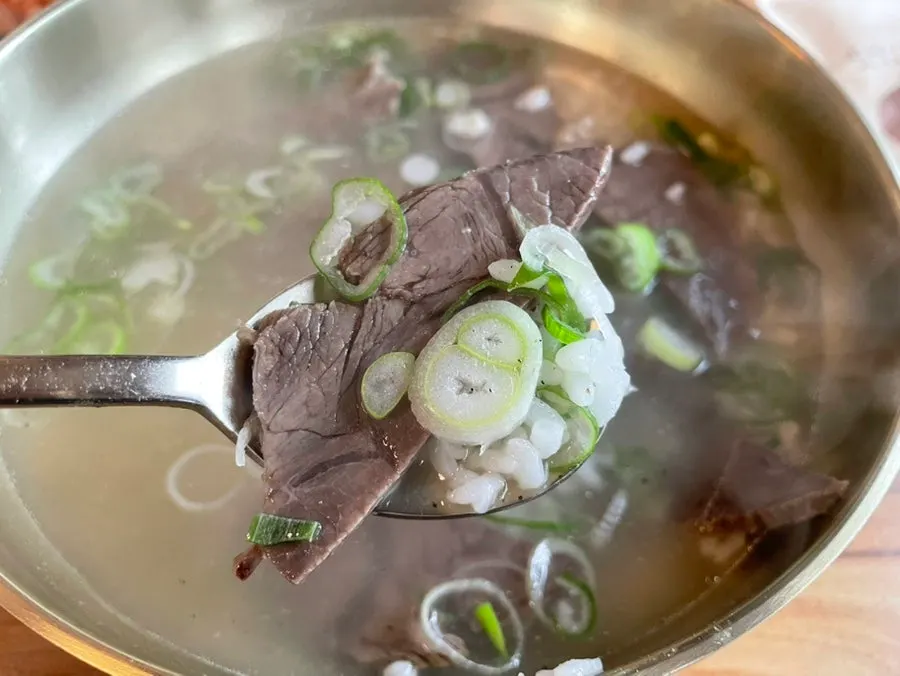 Gomtang broth with pepper sprinkled on top