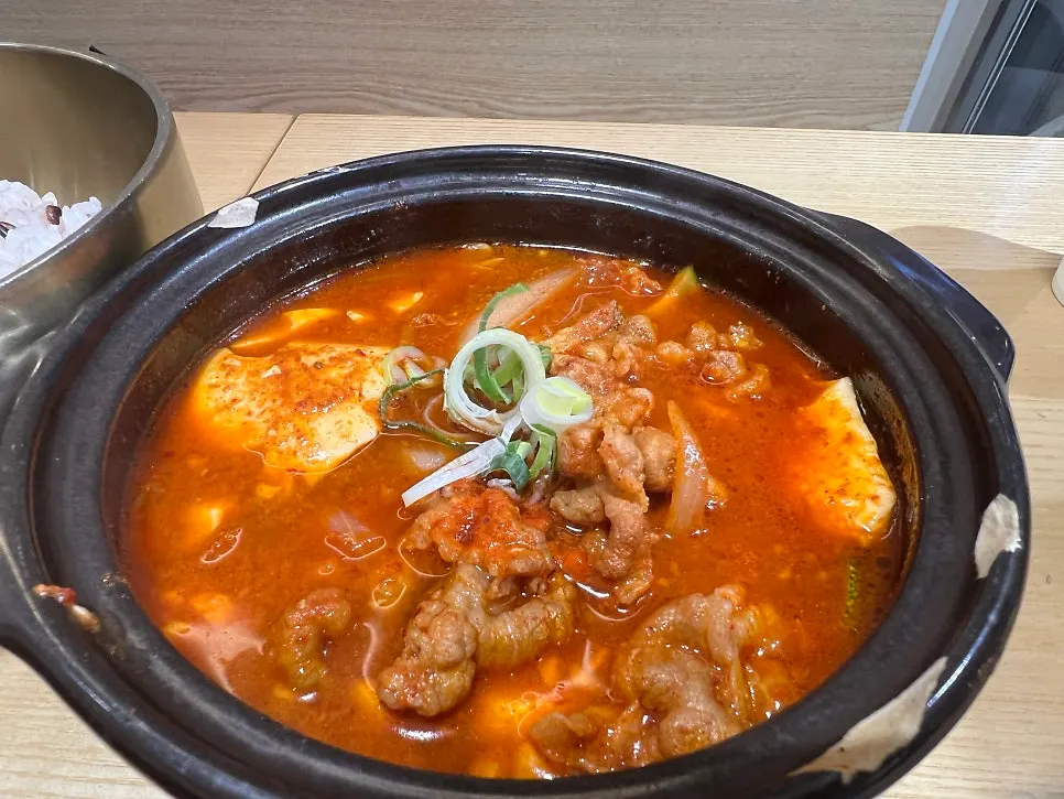 Jjageuli simmering in a stone pot