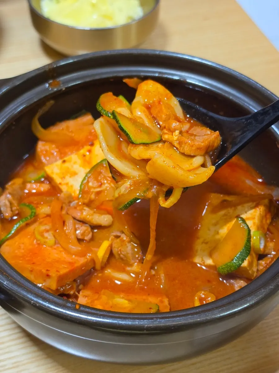 Potato sujebi scooped out of the stew