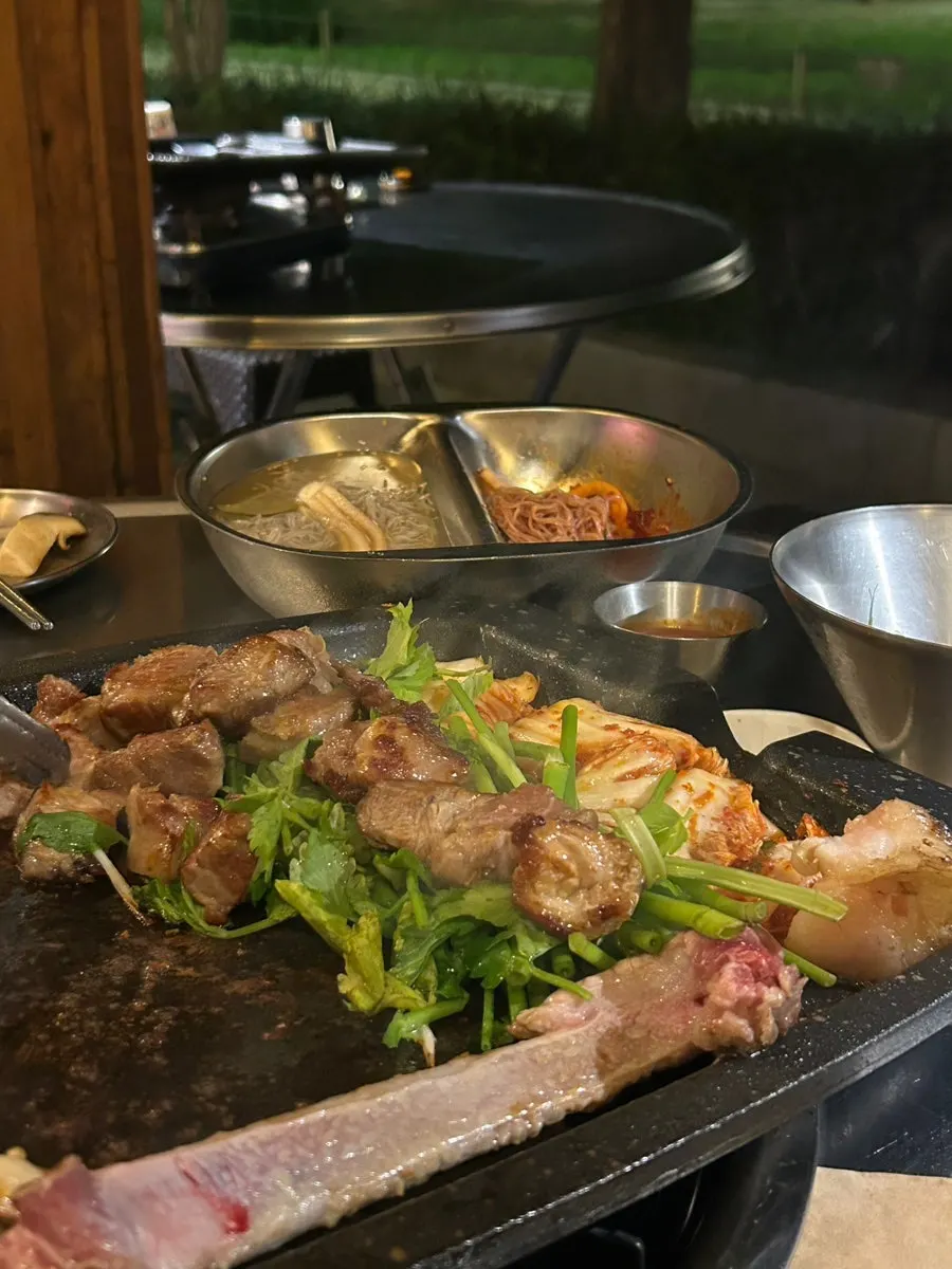 Outdoor-pub-like atmosphere at a Gyeongui Line Forest Park Korean BBQ restaurant