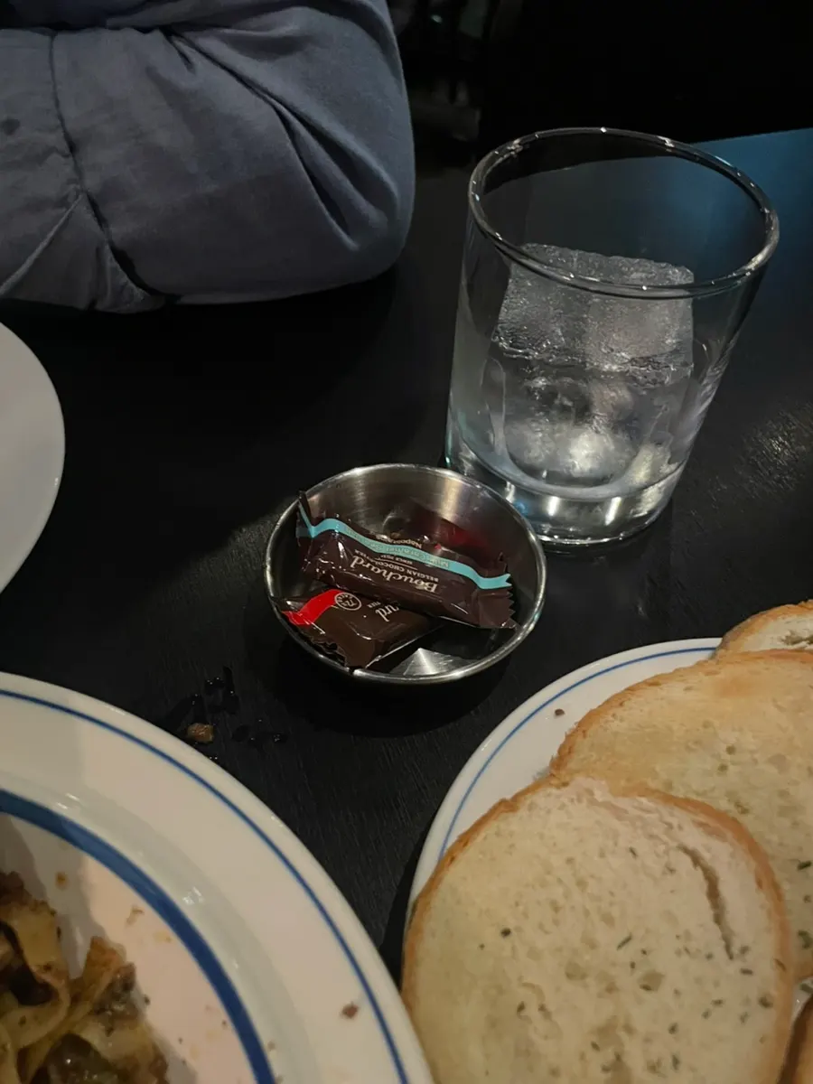 Tasting whisky while listening to the bartender's explanation