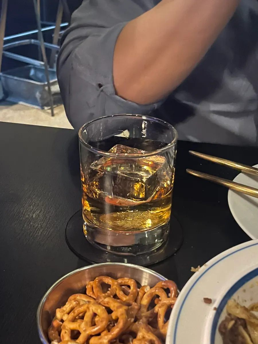A glass of Russell's Reserve Single Barrel bourbon