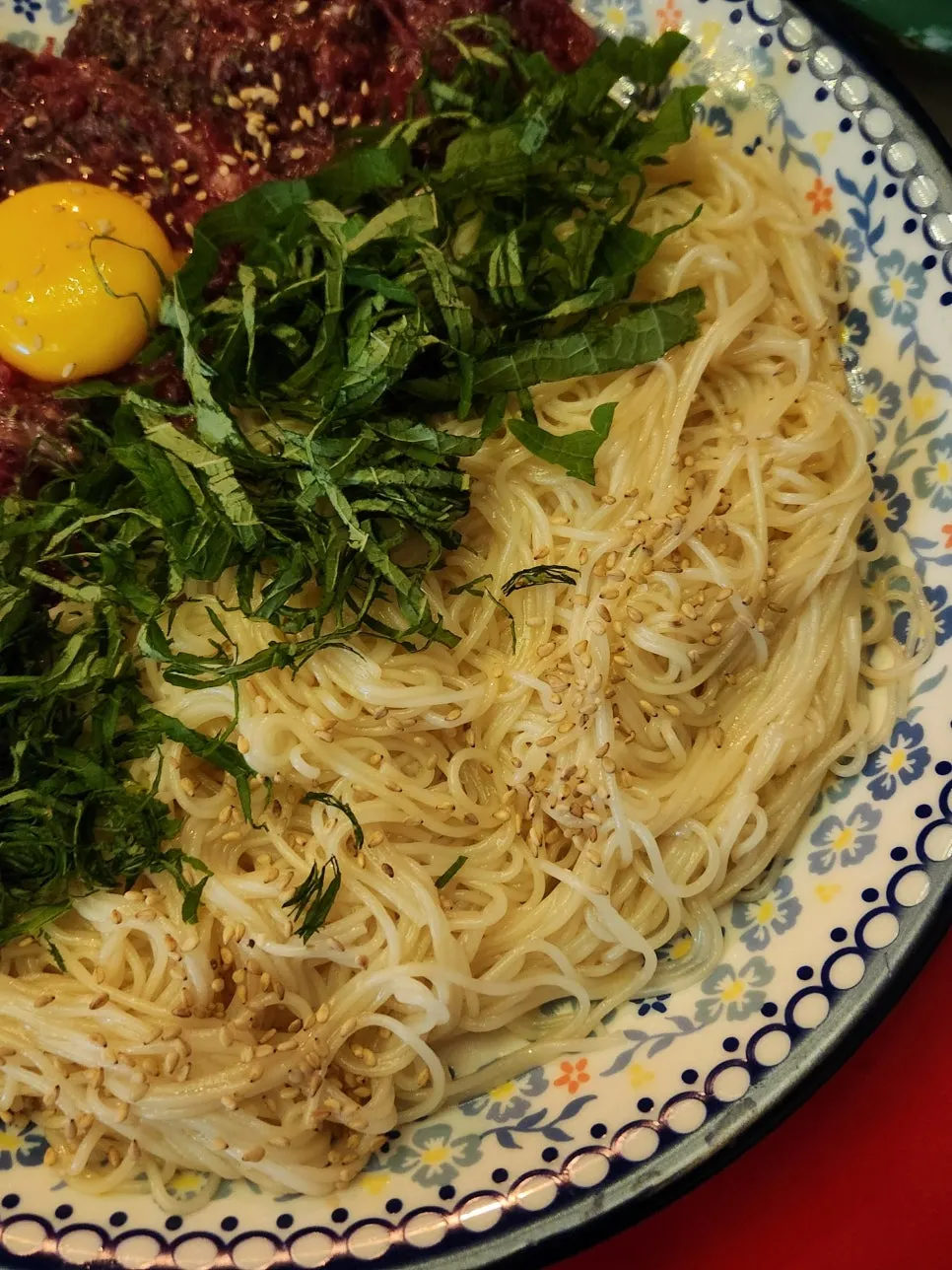 Somyeon noodles mixed with beef tartare