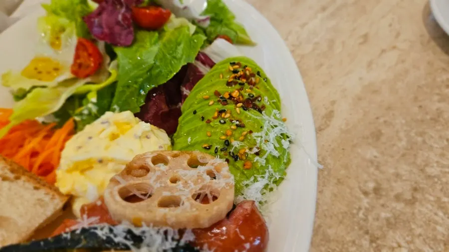 Plate with avocado and salad