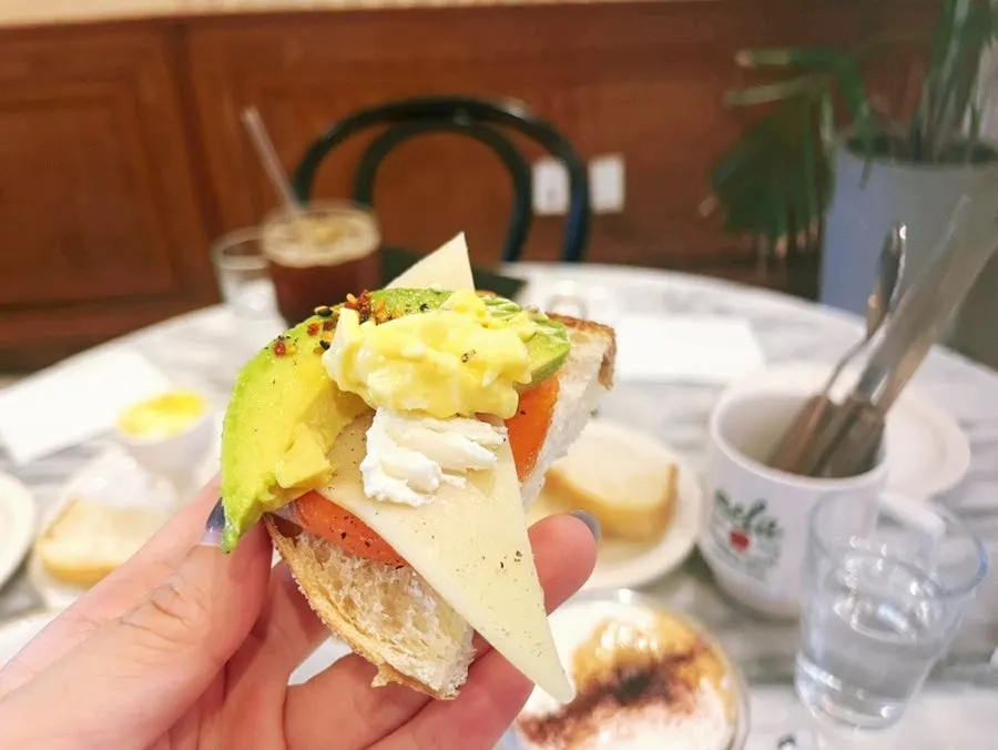 Salmon and cream piled on top of bread