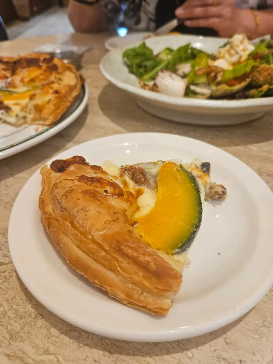 A slice of crisp pastry-crust pizza