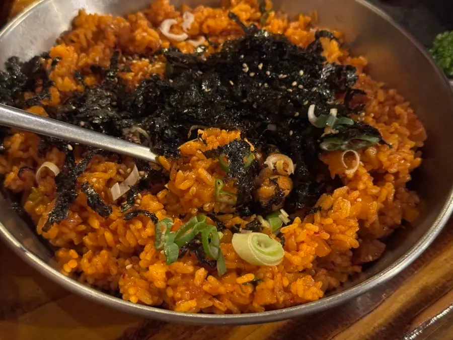 Dice rice served in a large earthenware bowl