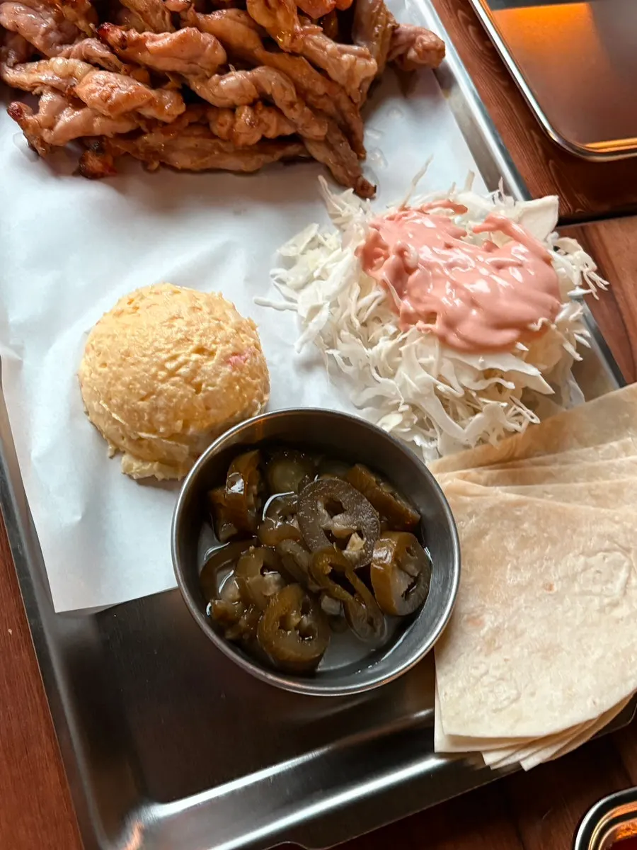 Charcoal chicken neck and yuringi at Kkoko Land, a Hongdae outdoor bar