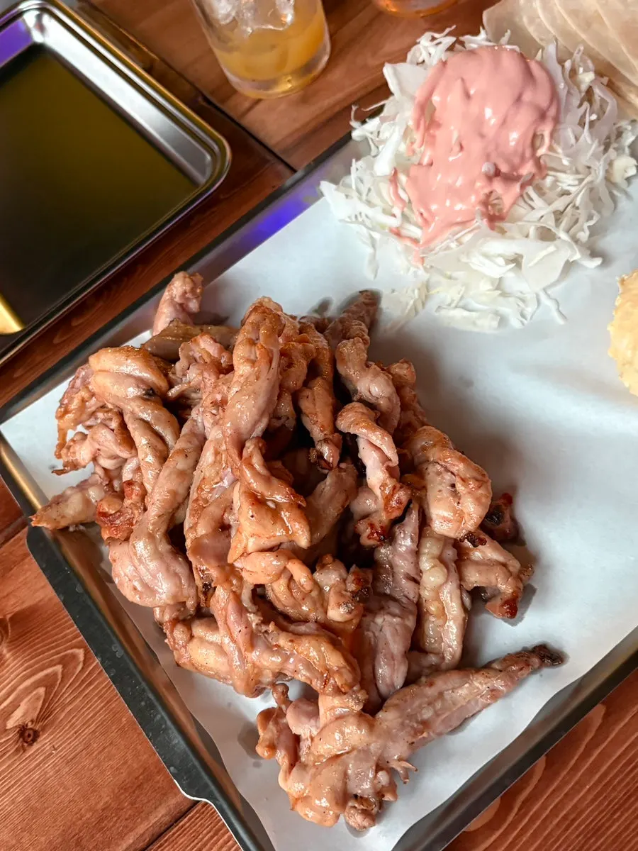Charcoal chicken neck and yuringi at Kkoko Land, a Hongdae outdoor bar