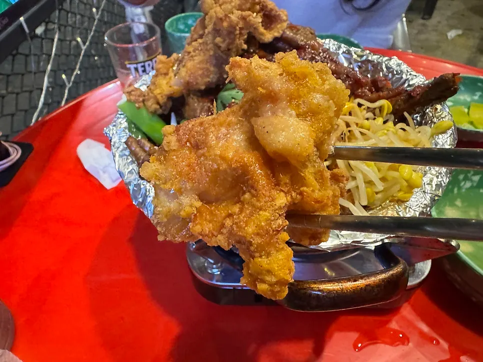 Close-up of the fried chicken skin on top of the soup chicken feet