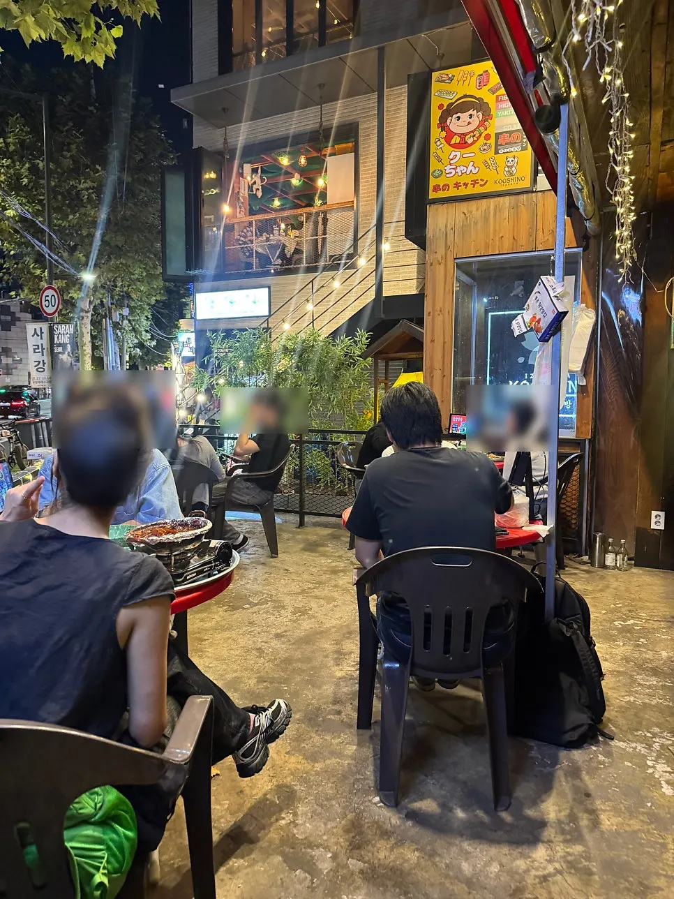 Outdoor terrace seating at Cheongnyeon Dakbal 1987 Hongdae Branch