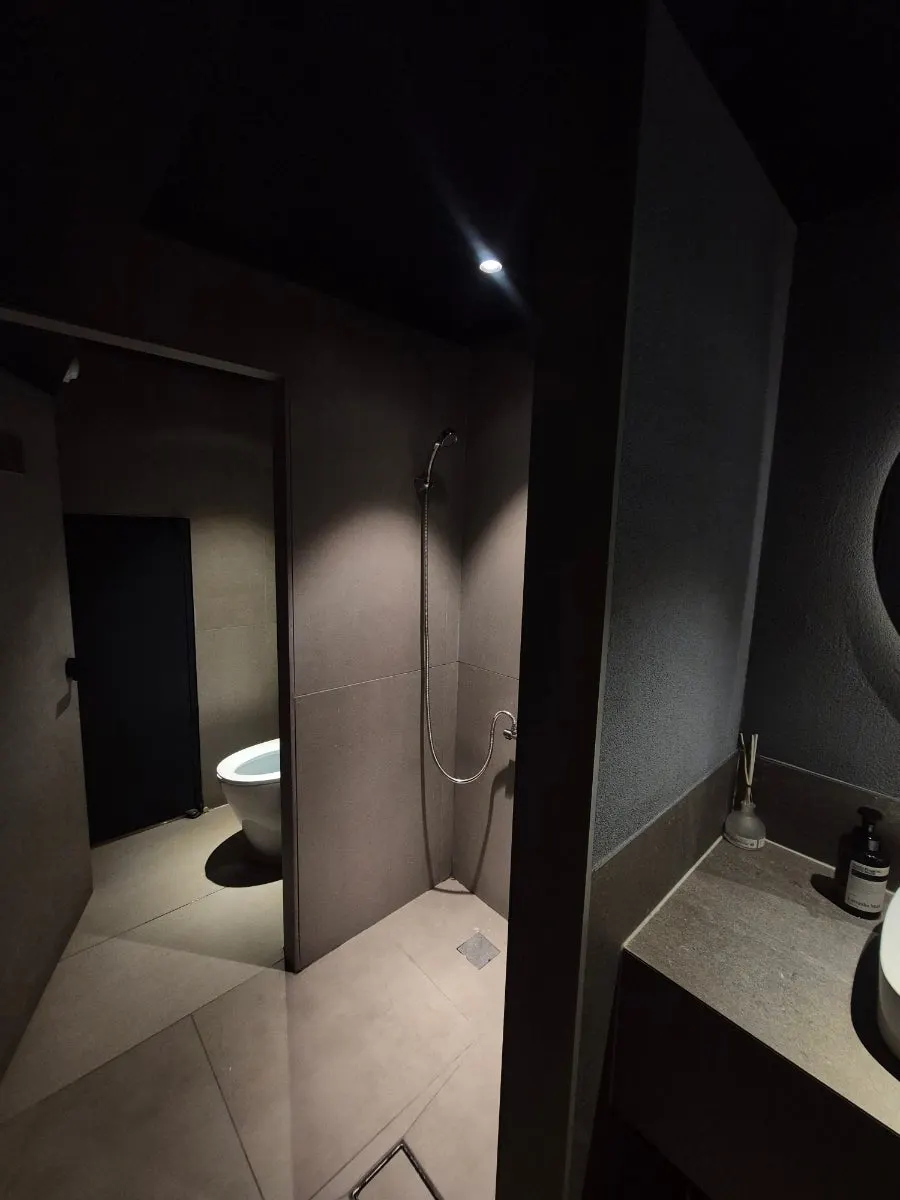 Clean restroom with a shower at the restaurant