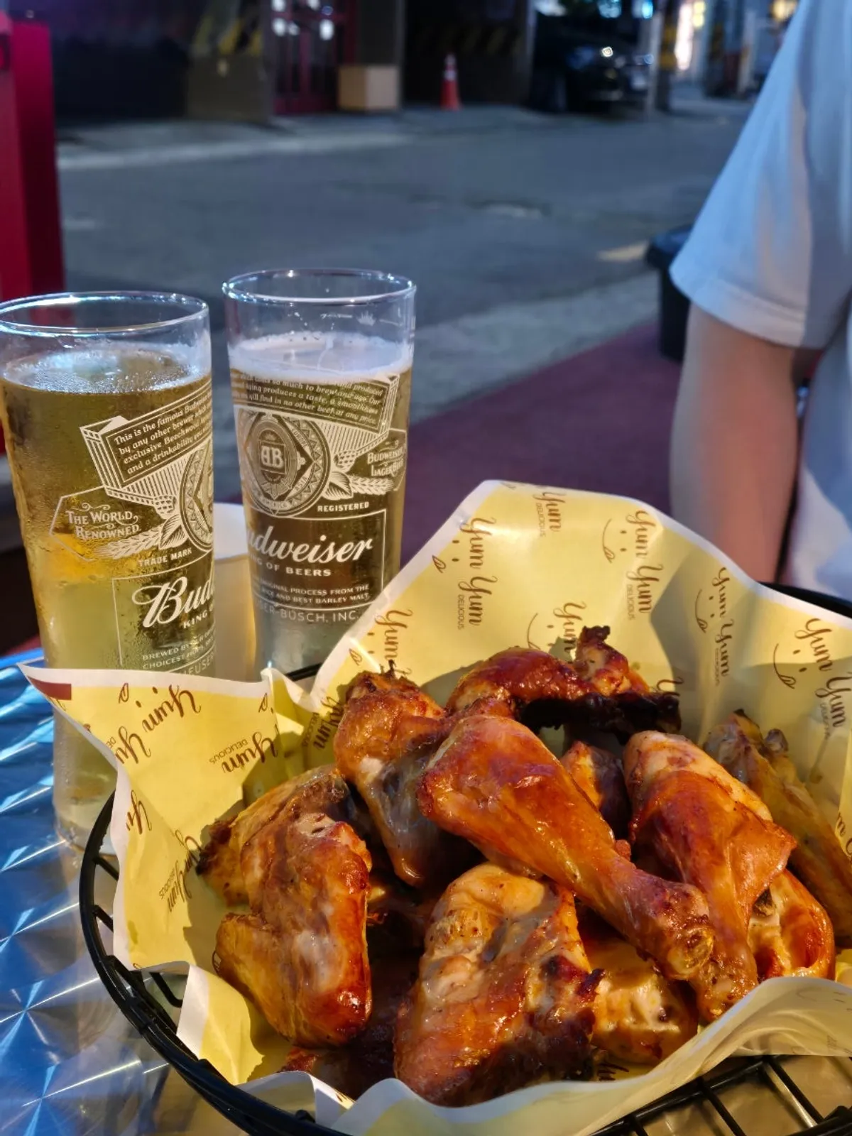 Original oven chicken and draft beer together on the outdoor table