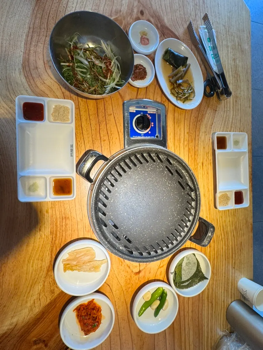 Basic banchan spread at Chopilsal Pork Grill Hongdae Branch